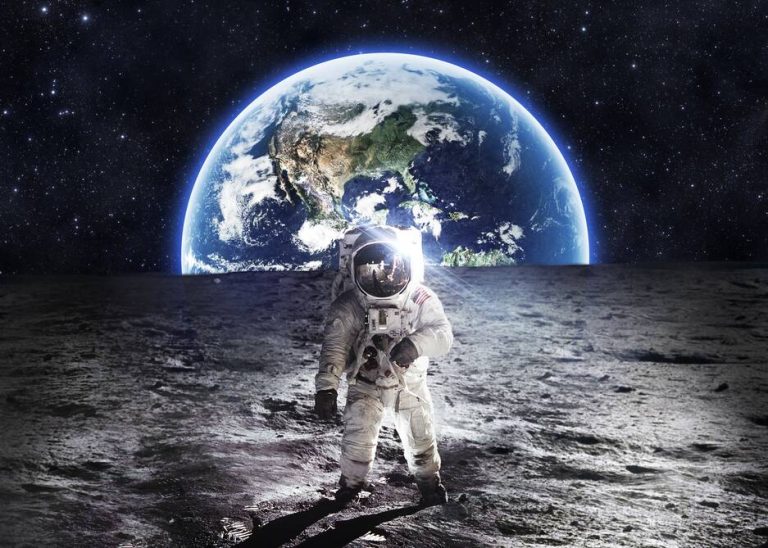 astronaut on moon, earth on background